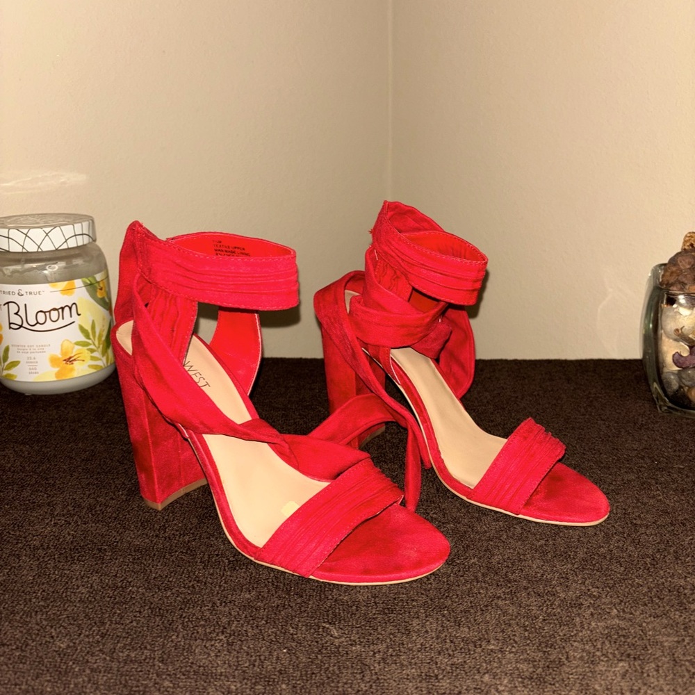 Sexy red sandals with tie; sleek & sassy; cute & comfortable.